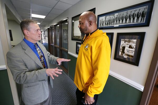 LaGrange Chief Louis M. Dekmar, left, pictured here with Troup County NAACP president Ernest Ward, made national headlines earlier this year when he apologized for his agency’s role in the 1940 lynching of a black man. CURTIS COMPTON/CCOMPTON@AJC.COM