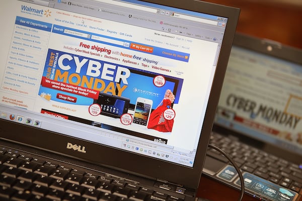 Retailers advertise Cyber Monday deals on their websites on November 26, 2012 in Chicago, Illinois. Americans were expected to spend $1.5 billion while shopping online that day, up 20 percent from the previous year.  (Photo by Scott Olson/Getty Images)