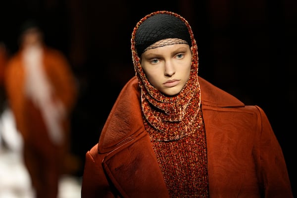 A model wears a creation as part of the Dries Van Noten Fall/Winter 2025-2026 Womenswear collection presented in Paris, Wednesday, March 5, 2025. (Photo by Scott A Garfitt/Invision/AP)