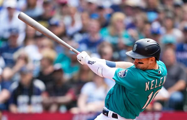 Seattle Mariners' Jarred Kelenic swings during an at-bat against the Pittsburgh Pirates in a baseball game Saturday, May 27, 2023, in Seattle. (AP Photo/Lindsey Wasson)