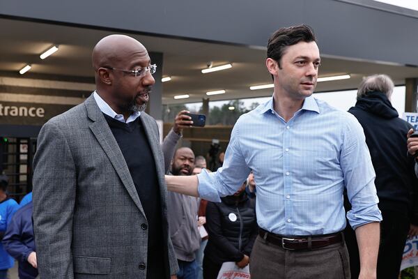 (Left to right) Sen. Raphael Warnock chats with Sen. Jon Ossoff, who worked with House Republicans to get the funding for Georgia projects.
