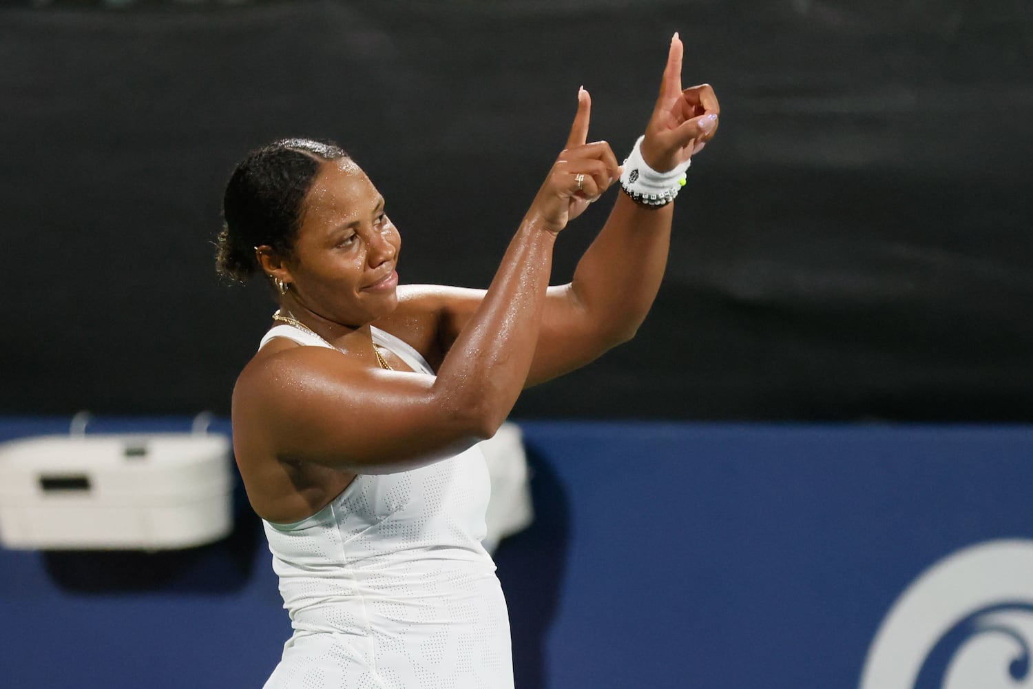 Taylor Townsend draws a heart in the air to the chair judge during an exhibition match in the  Atlanta Open at Atlantic Station on Sunday, July 21, 2024, in Atlanta.
(Miguel Martinez / AJC)