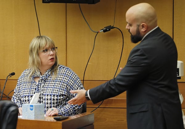 Lillian Govus, who was the water department’s former communications director, is cross examined by defense attorney Scott Grubman. The trial continued in the first-ever criminal prosecution of an alleged violation of the Georgia Open Records Act. Jenna Garland, a former press secretary to ex-Atlanta Mayor Kasim Reed, is accused of ordering a subordinate to delay the release of water billing records requested by Channel 2 Action News that were politically damaging to Reed and other city elected officials. BOB ANDRES / BANDRES@AJC.COM