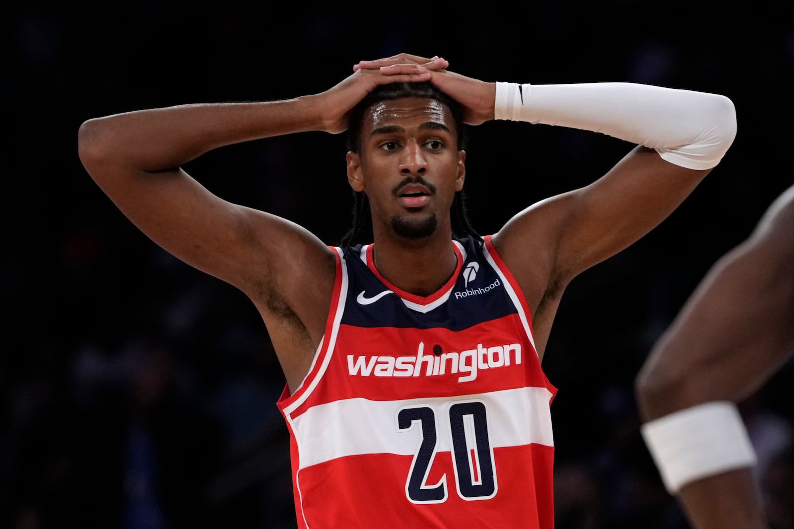 Washington Wizards' Alex Sarr stands on the court during the first half of a preseason NBA basketball game against the New York Knicks, Wednesday, Oct. 9, 2024, in New York. (AP Photo/Pamela Smith)