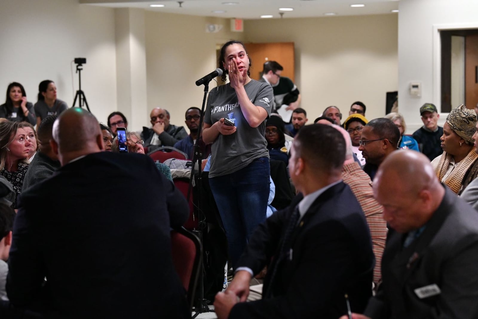 Ivy Treadwell-Garcia, a former Cobb County Adult Detention Center inmate, shares  her experience Tuesday during a town hall meeting on conditions at the jail. Credit: Hyosub Shin/The Atlanta Journal-Constitution