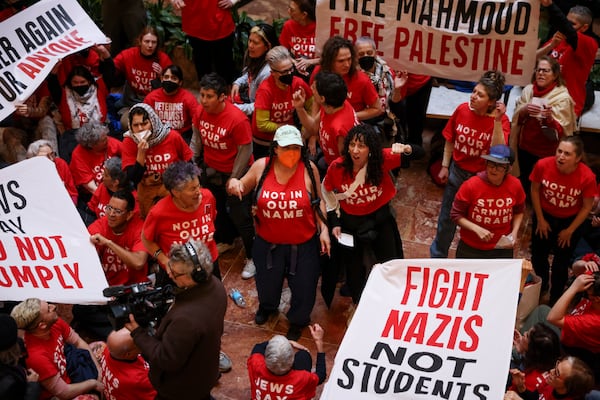 Demonstrators from the group, Jewish Voice for Peace, protest inside Trump Tower in support of Columbia graduate student Mahmoud Khalil, Thursday, March 13, 2025, in New York. (AP Photo/Yuki Iwamura)