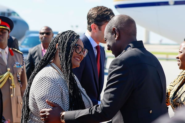 Kenya's President William Ruto is greeted by U.S. Rep. Nikema Williams, D-Atlanta, as he arrives for a state visit at Hartsfield-Jackson Atlanta International Airport on Monday, May 20, 2024. His work agenda includes visits to the CDC, MLK museum, Coca-Cola, Carter Center, and Tyler Perry Studios.
(Miguel Martinez / AJC)