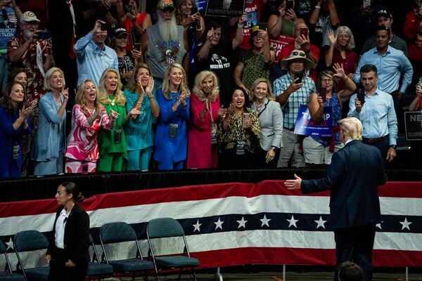 
                        Attendees cheer as former President Donald Trump greets the crowd after speaking during a campaign rally at the Van Andel Arena in Grand Rapids, Mich., on Saturday, July 20, 2024.  (Haiyun Jiang/The New York Times)
                      