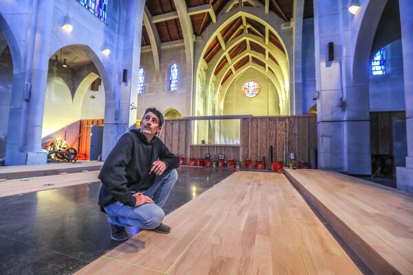  Eddie Pirttle works in the Abbey’s Church where a major renovation is underway on Thursday, Jan 13, 2022.  (John Spink / John.Spink@ajc.com)

