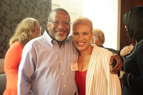 Kaaryn Walker (right), with her father Bobby Burton. Burton was shot three times in the back during the Orangeburg Massacre in 1968. He recently survived a bout with COVID-19.