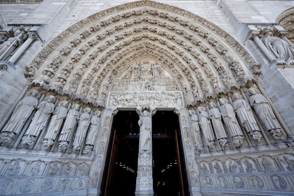 The main entrance of Notre-Dame de Paris cathedral is pictured after French President Emmanuel Macron visited the restored interiors of the monument, Friday Nov. 29, 2024, in Paris. (Stephane de Sakutin, Pool via AP)