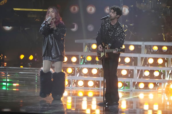 Joe Jonas and Eva Taubert perform during the 25th Latin Grammy Award ceremony, Thursday, Nov. 14, 2024, in Miami. (AP Photo/Lynne Sladky)