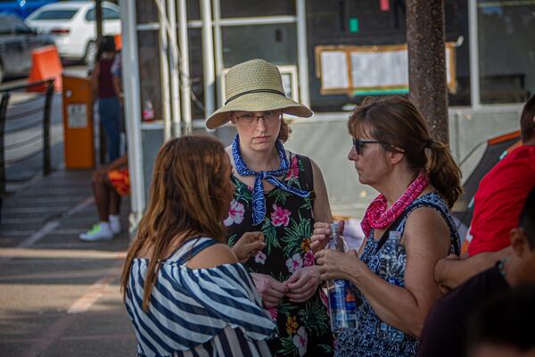 Traci Feit Love (center) with her interpreter Julie Manrique and an asylum-seeker in Matamoros, Mexico. CONTRIBUTED BY MICHAEL NIGRO