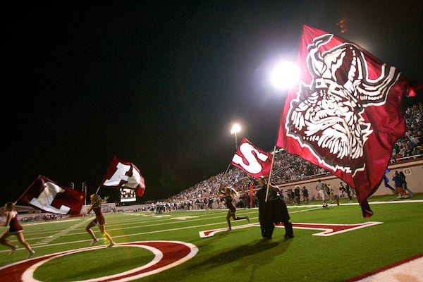 Cheerleaders celebrate at Martin Stadium in Valdosta. The stadium holds 12,000 fans and is home to the Lowndes County Vikings.