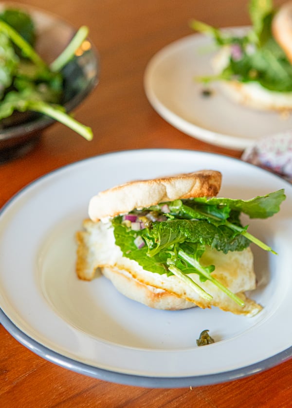 Egg and Cream Cheese Breakfast Sandwiches with Kale Salad. (Aaliyah Man for The Atlanta Journal-Constitution / Food styling by Kate Williams)