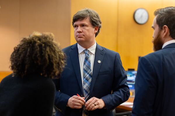 Deputy Attorney General Logan Winkles, representing Gov. Brian Kemp on behalf of the state, said critics of the State Election Board can’t compel to governor to start an investigation. “The court can imagine the chaos that would cause,” Winkles said. (Arvin Temkar/AJC)