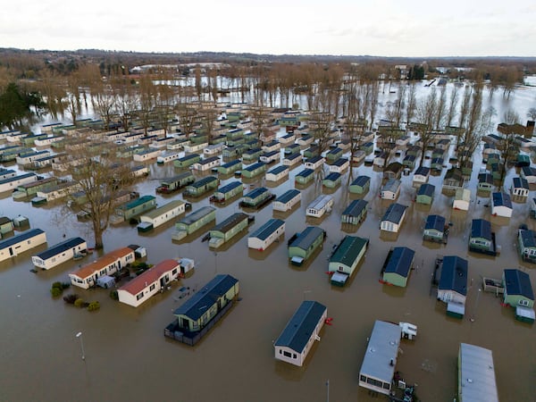 Flooded caravans at Billing Aquadrome Holiday Park, as Storm Bert continues to cause disruption, in Northampton, England, Monday, Nov. 25, 2024. (Jordan Pettitt/PA via AP)