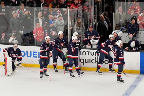 United States players watch Canada celebrate after an overtime loss following the 4 Nations Face-Off championship hockey game, Thursday, Feb. 20, 2025, in Boston. (AP Photo/Charles Krupa)