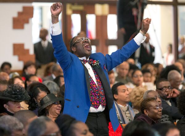 Elder Cal Murrell reacts to a speaker during the Rev. Martin Luther King Jr. holiday commemorative service at Ebenezer Baptist Church Monday, Jan. 20, 2014, in Atlanta. (AJC file photo/Jason Getz)