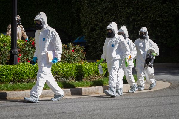 Members of the 265th Infectious Control GA Army National Guard enters the Canterbury Court, a senior living facility in Buckhead. Gov. Brian Kemp has sent guard members to disinfect many long-term-care facilities, even those with no coronavirus outbreaks, as a preventative measure. STEVE SCHAEFER / SPECIAL TO THE AJCs.