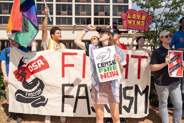 Protesters line the streets in front of the GSU convocation center A large crowd of Trump supporters are lining the streets of Atlanta ahead of the former presidents rally. Saturday, August 3rd, 2024 (Ben Hendren for the Atlanta Journal-Constitution)