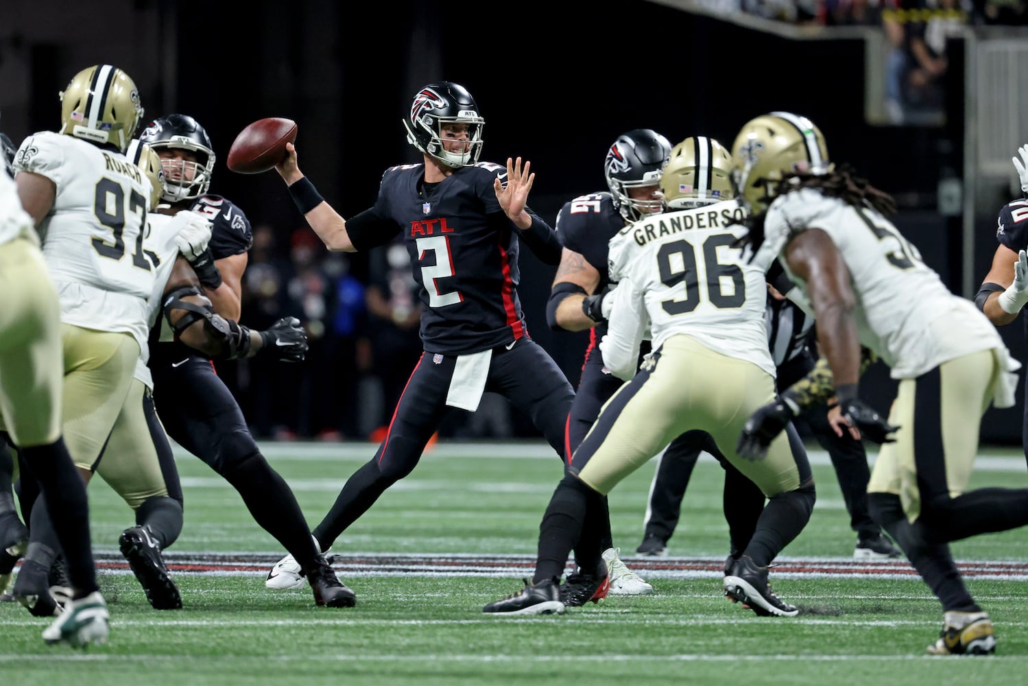 Falcons quarterback Matt Ryan (2) attempts a pass during the first quarter. Ryan was a dismal 7-of-11 for 62 yards, with an interception and zero touchdowns in the first half. ( JASON GETZ FOR THE ATLANTA JOURNAL-CONSTITUTION)