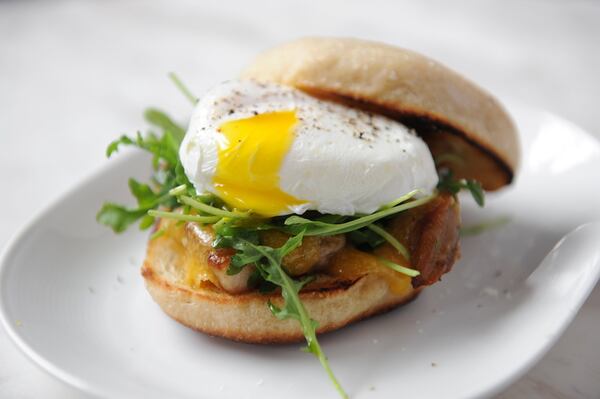 The Amer egg sandwich with soft poached farm egg, confit pork belly, cheddar and chipotle glaze.(Beckysteinphotography.com)