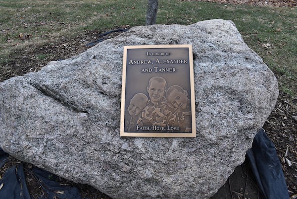 This plaque honors the missing Skelton brothers in the municipal park on the banks of Bean Creek in Morenci, Mich., on Jan. 27, 2017. (Dale G. Young/Detroit News via AP)