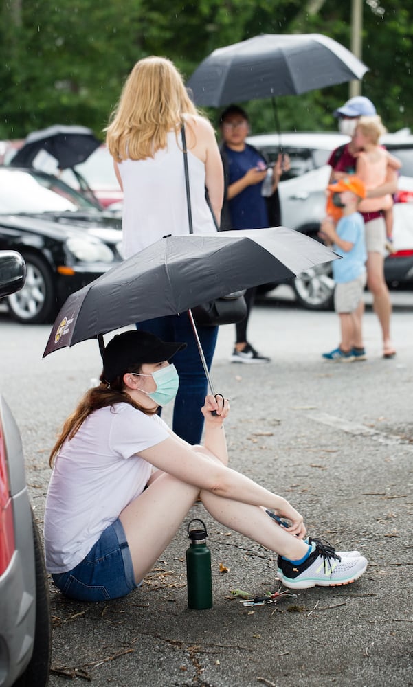 PHOTOS: Georgia voters struggle with long lines, new equipment, social distancing