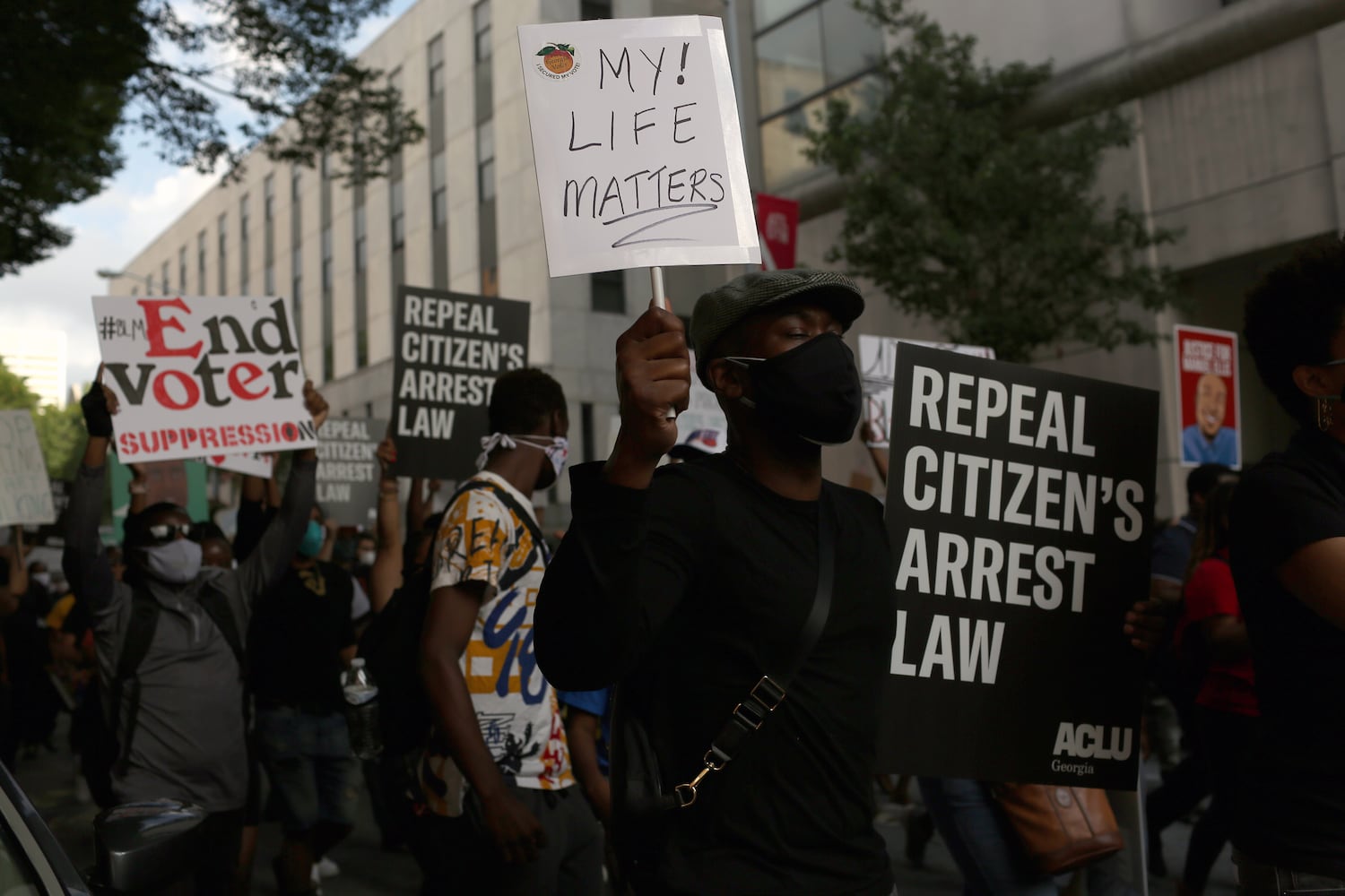 PHOTOS: Thousands march at Georgia Capitol as lawmakers return