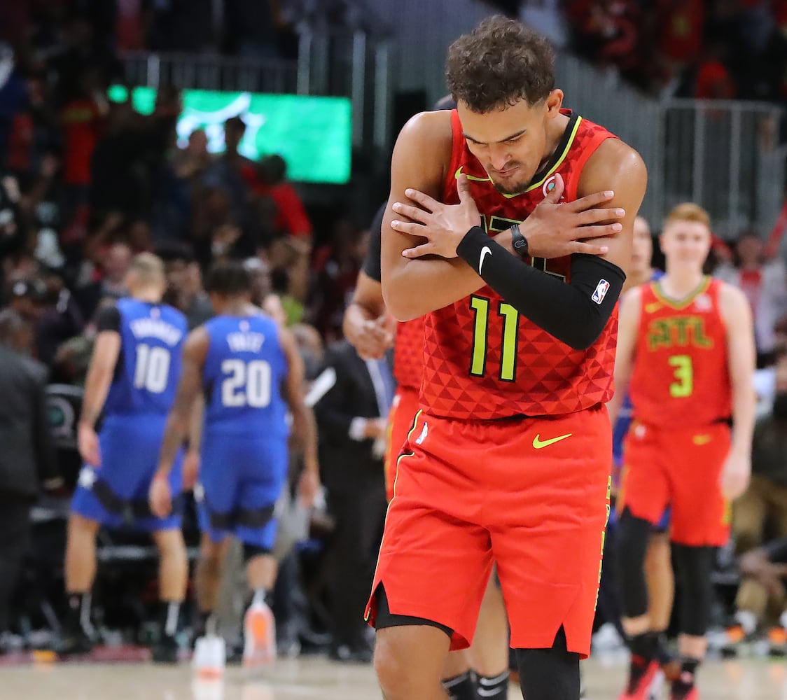 Photos: Hawks edge Magic in home opener