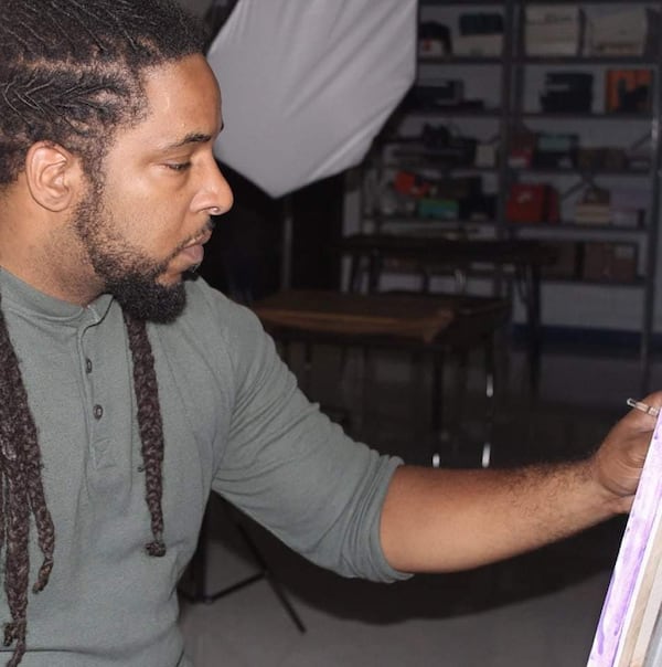 Arshaad Norwood, who is 40, fell in love with painting as a teenager. Today, he teaches photography and graphic design at Westlake High School and continues to work as an artist. Photo: Courtesy of Arshaad Norwood