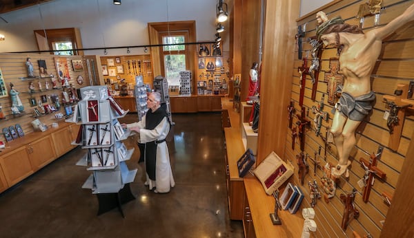 January 13, 2022 Atlanta: Brother Michael Lautieri works the Abbey Store on Thursday, Jan 13, 2022. The order of Cistercians of the Strict Observance (OCSO), commonly called the Trappists were founded in the 11th century and follow the rule of St. Benedict in their Christian monastic practice. (John Spink / John.Spink@ajc.com)

