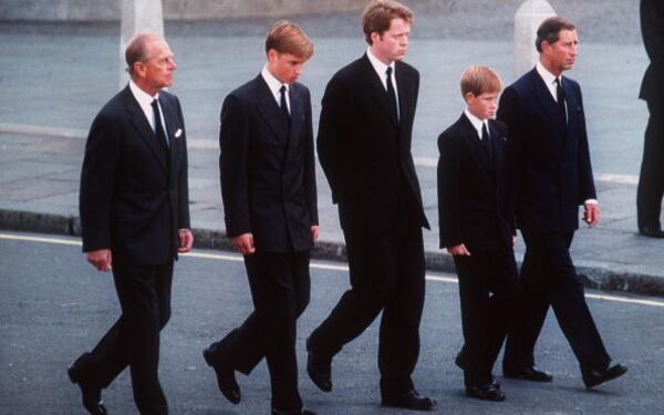 Prince Philip, the Duke of Edinburgh,left, Prince William, Earl Spencer, Prince Harry and Prince Charles, the Prince of Wales follow the coffin of Diana, Princess of Wales in London on September 6, 1997. The funeral took place seven days after she was killed in a car crash in Paris. Members of the royal family walked in the procession behind the coffin, as did 500 representatives of the charities associated with the Princess.  At least a million people lined the streets of central London to watch the procession from Kensington Palace to Westminster Abbey.