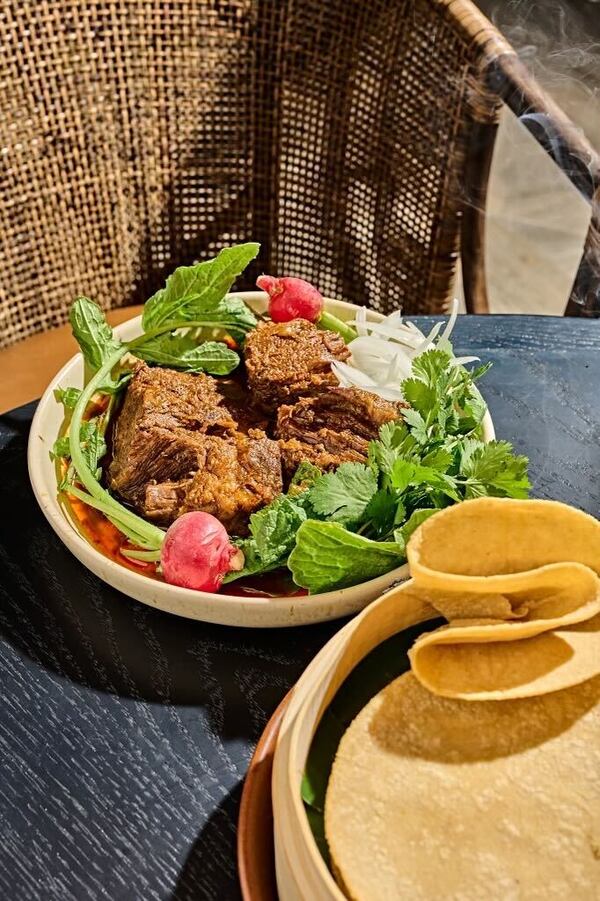 The short rib birria at Casa Balam in Decatur is served family style with housemade tortillas and assorted salsas. /  Courtesy of Casa Balam