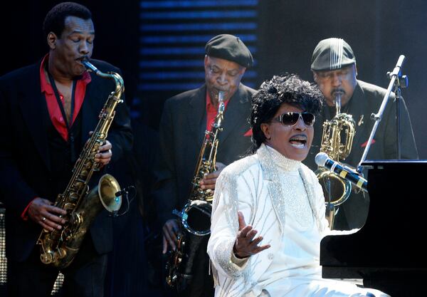 FILE - In this July 22, 2001 file photo, Little Richard performs at the 93rd birthday and 88th year in show business gala celebration for Milton Berle, in Beverly Hills, Calif. Little Richard, the self-proclaimed “architect of rock ‘n’ roll” whose piercing wail, pounding piano and towering pompadour irrevocably altered popular music while introducing black R&B to white America, has died Saturday, May 9, 2020.