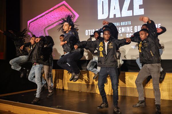 Members of the Alpha Rho Chapter of Alpha Phi Alpha Fraternity Inc. step for guests during UATL’s movie night featuring a viewing of “School Daze” at The Plaza Theatre on Tuesday, Sept. 24, 2024. (Natrice Miller/ AJC)