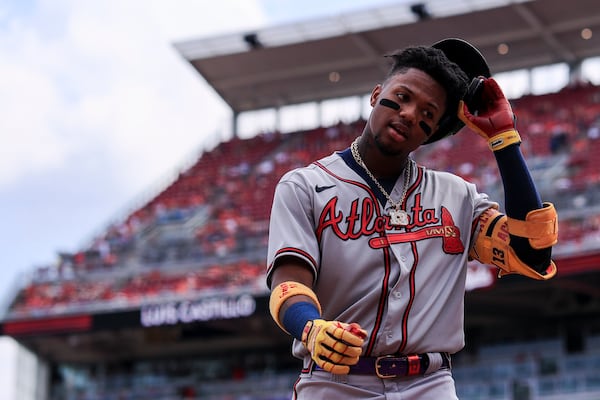 Atlanta Braves' Ronald Acuna Jr. walks to the dugout during a baseball game against the Cincinnati Reds in Cincinnati, Saturday, June 26, 2021. The Reds won 4-1. (AP Photo/Aaron Doster)