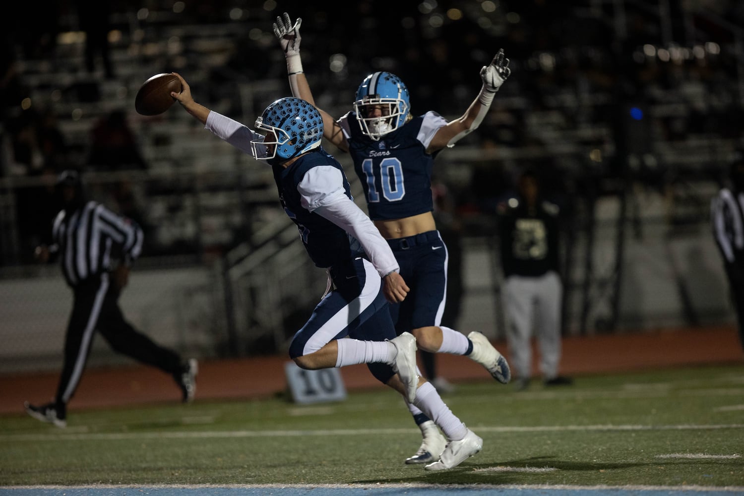 Cambridge's Zach Harris (15) scores a touchdown during a GHSA high school football game between Cambridge and South Paulding at Cambridge High School in Milton, GA., on Saturday, November 13, 2021. (Photo/Jenn Finch)