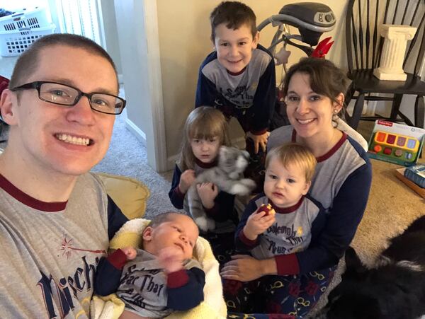 Chester Banaszak of Alpharetta holds his newborn daughter Geneviève while posing with his wife Maria and children CJ, Veronica and Ambrose in their matching pajamas on Christmas Day 2019. Photo courtesy of Chester Banaszak.