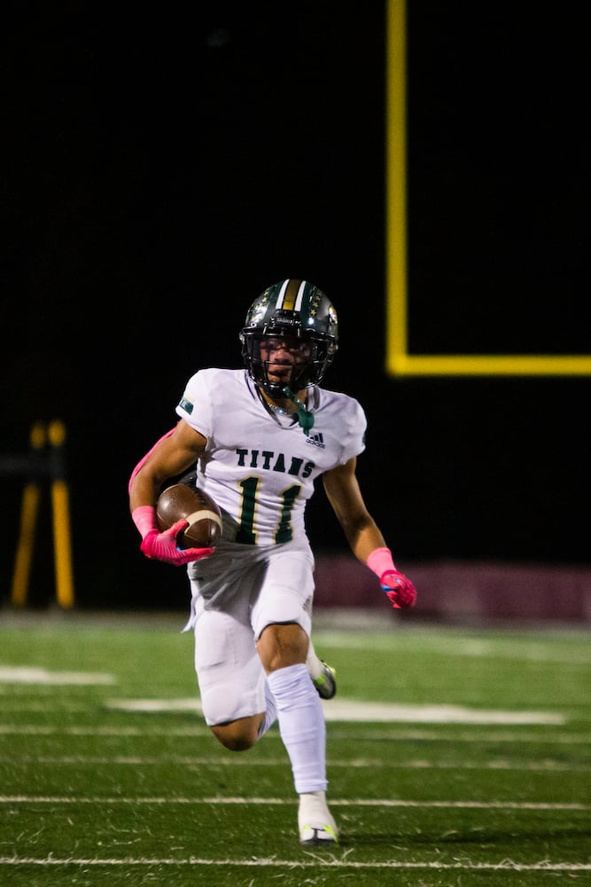 Zyon Mckenzie, wide receiver for Alpharetta, runs the ball during the Alpharetta vs. Blessed Trinity high school football game on Friday, October 28, 2022, at Alpharetta high school in Alpharetta, Georgia. Alpharetta led Blessed Trinity 21-7 at the end of the first half.