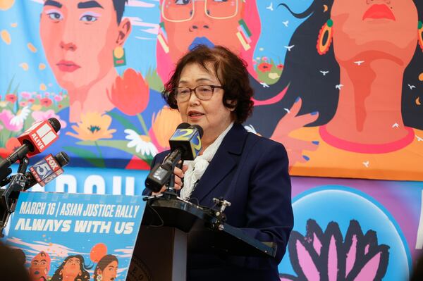 Korean community elder Kook Ja Lee speaks during the Asian Americans Rise Against Hate event at Georgia Freight Depot in Atlanta on Thursday, March 16, 2023.  (Natrice Miller/ natrice.miller@ajc.com) March 16 marks the two year anniversary of the Atlanta spa shootings that took the lives of eight people including six Asian Americans. (Natrice Miller/ natrice.miller@ajc.com)