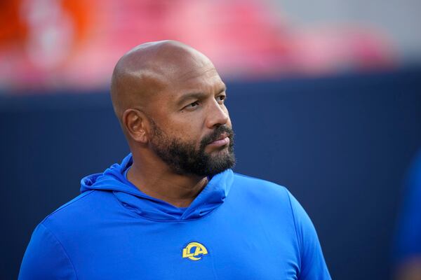 Jimmy Lake was an assistant with the Rams last season. (AP Photo/David Zalubowski)