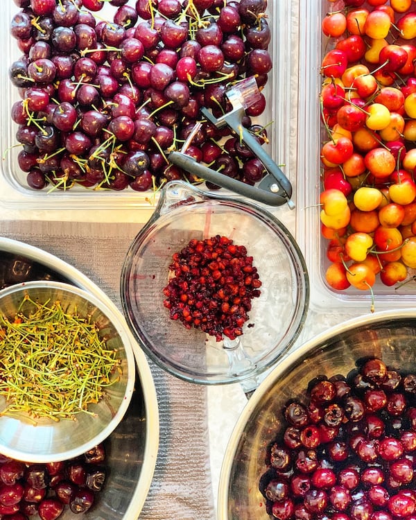 During a recent two-day canning session in Madison, Wisconsin, Asha Gomez helped her host Dennis Landon turn cherries into myriad preserves, including for pie filling. CONTRIBUTED BY ASHA GOMEZ