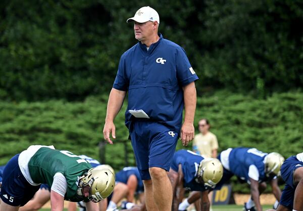 Chris Weinke, Quarterbacks/Co-Offensive Coordinator, watches during a training camp at Georgia Tech’s Rose Bowl Field, Tuesday, August 1, 2023, in Atlanta. (Hyosub Shin / Hyosub.Shin@ajc.com)