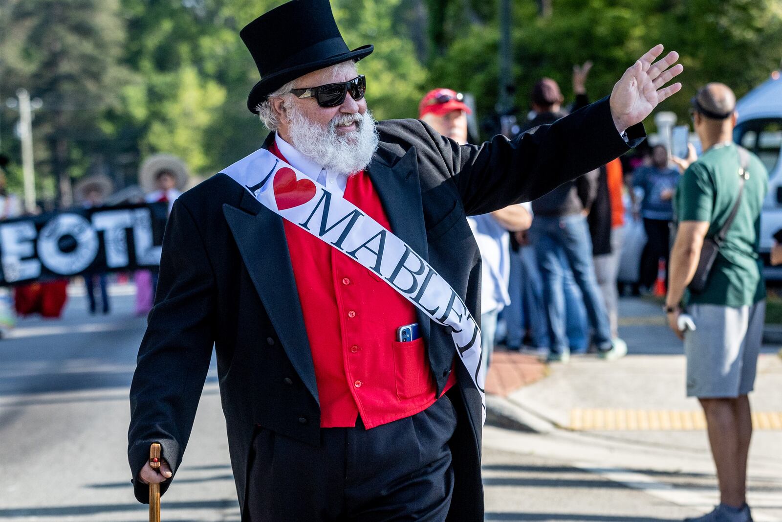 Jeff Padgett waves to the crowd during the second Taste Of  Mableton Festival parade Saturday, April 15, 2023. Today is Election Day in Mableton. Voters will choose the new city’s and several city council members. (Steve Schaefer/The Atlanta Journal-Constitution)