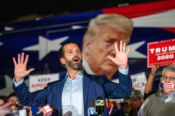 11/05/2020 —  Atlanta, Georgia — Donald Trump Jr. makes remarks during a rally in the parking lot at the Georgia Republican Party Headquarters in Atlanta’s Buckhead community, Thursday, November 5, 2020. Trump Jr. spoke a little while after his father, President Donald Trump, made remarks at the White House in Washington, D.C. (Alyssa Pointer / Alyssa.Pointer@ajc.com)