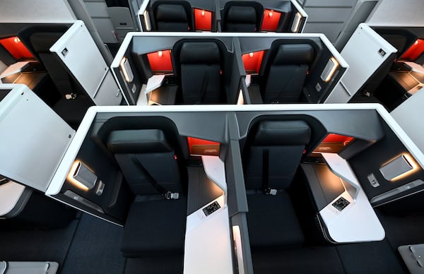 Photo shows the newly deigned Delta One Suites during a media preview of an Airbus A350 at Delta TechOps, Friday, January 24, 2025, in Atlanta. Delta unveiled a new cabin design on Tuesday, featuring improved lighting, seating and refreshed branding elements.  (Hyosub Shin / AJC)