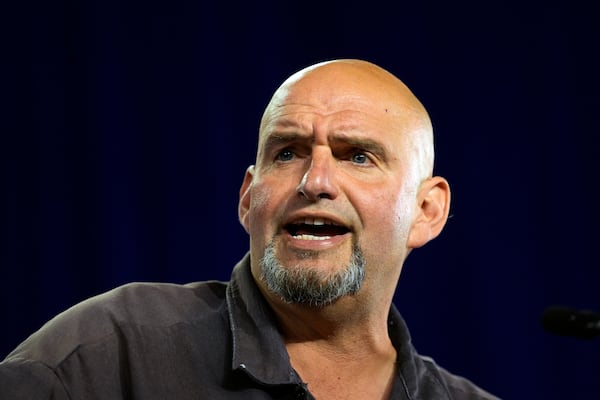 FILE - Sen. John Fetterman, D-Pa., speaks ahead of Democratic vice presidential candidate Minnesota Gov. Tim Walz during a campaign event in York, Pa, Oct. 2, 2024. (AP Photo/Matt Rourke, File)