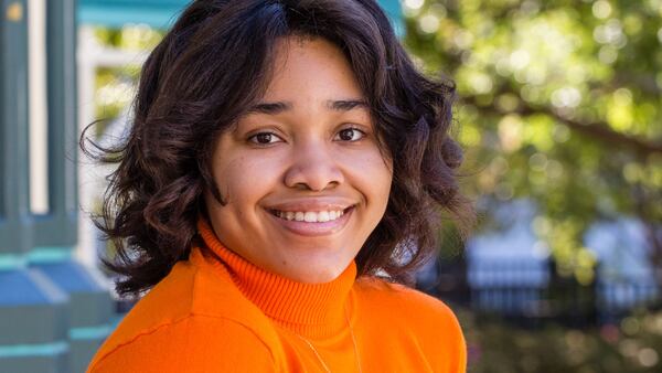 Kayla Smith is a Spelman College student working to navigate covid and her senior thesis as well as working to stay connected to her school.  Smith spends time in Decatur Square on Friday, Nov 13, 2020.  (Jenni Girtman for The Atlanta Journal-Constitution)